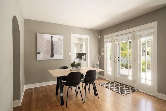 321 E Brown, Fresno, CA 93704 - dining room with wood finished floors and arched walkways