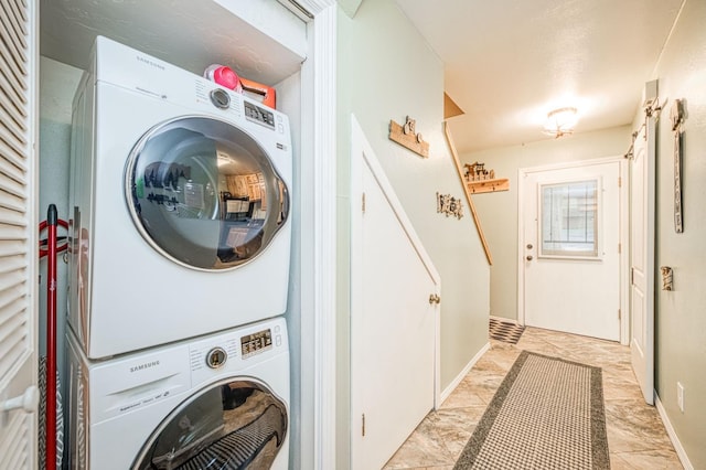 40748 Mill Run Ln Unit 5, Shaver Lake, CA 93664 - laundry area with stacked washer / dryer and baseboards