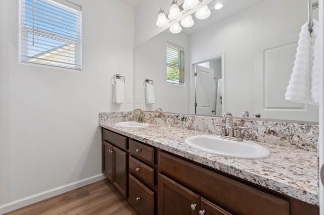 1567 Las Rosas Ave, Clovis, CA 93619 - full bath featuring double vanity and wood finished floors
