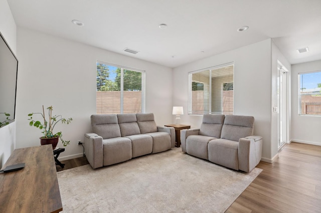 1567 Las Rosas Ave, Clovis, CA 93619 - living area featuring light wood-style floors and recessed lighting