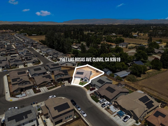 1567 Las Rosas Ave, Clovis, CA 93619 - aerial overview of property's location featuring property boundaries highlighted and nearby suburban area