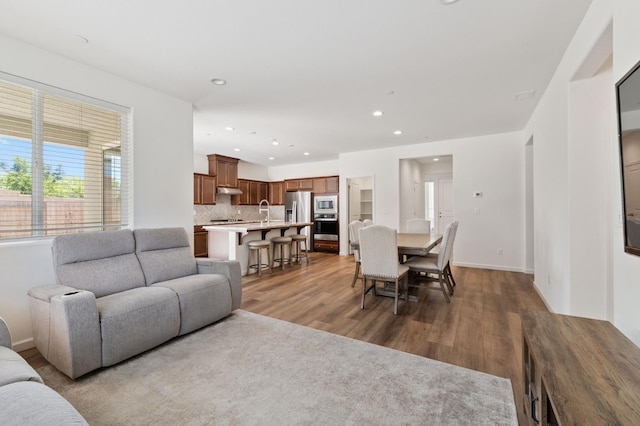 1567 Las Rosas Ave, Clovis, CA 93619 - living room with light wood-type flooring and recessed lighting