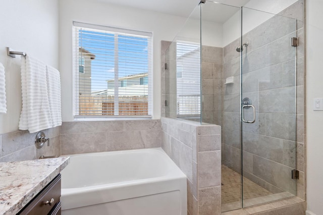 1567 Las Rosas Ave, Clovis, CA 93619 - bathroom featuring a garden tub, a stall shower, plenty of natural light, and vanity