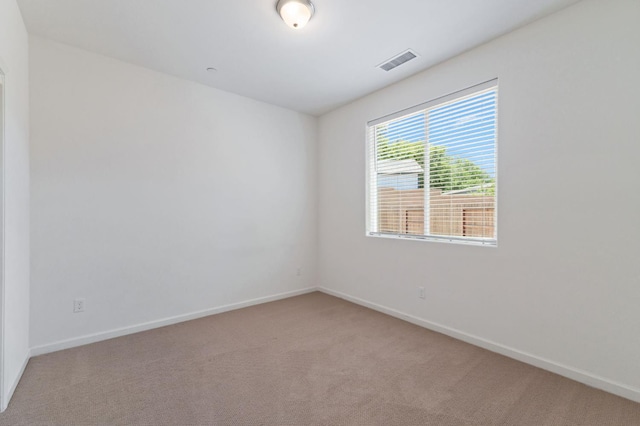 1567 Las Rosas Ave, Clovis, CA 93619 - empty room with light carpet and baseboards