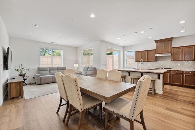 1567 Las Rosas Ave, Clovis, CA 93619 - dining room featuring light wood-type flooring and recessed lighting