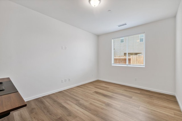 1567 Las Rosas Ave, Clovis, CA 93619 - unfurnished room with light wood-type flooring and baseboards