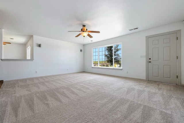 570 S Lassen Ave, Kerman, CA 93630 - empty room featuring a ceiling fan and carpet
