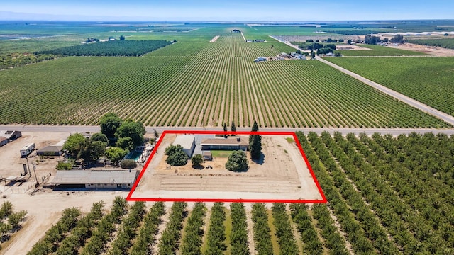 570 S Lassen Ave, Kerman, CA 93630 - aerial view of sparsely populated area with large plots for crops and property parcel outlined