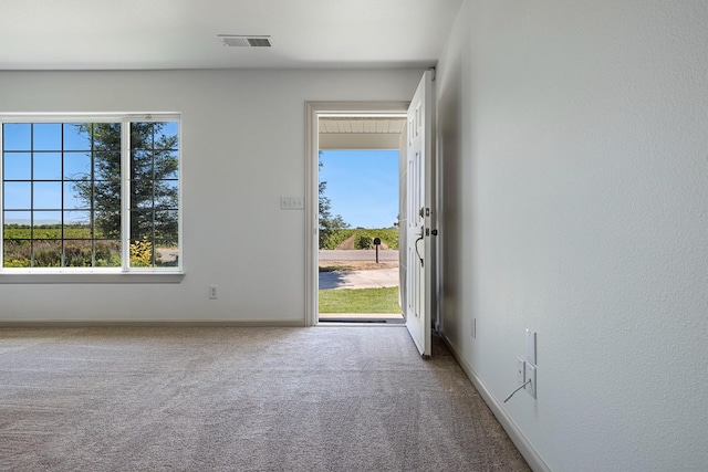 570 S Lassen Ave, Kerman, CA 93630 - foyer entrance with carpet and baseboards