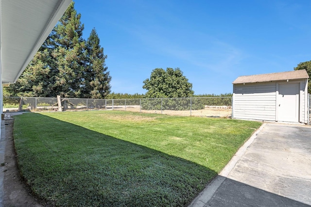 570 S Lassen Ave, Kerman, CA 93630 - view of yard featuring a storage unit