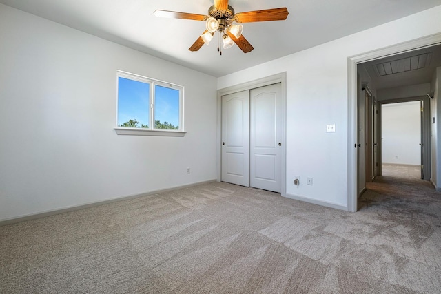 570 S Lassen Ave, Kerman, CA 93630 - unfurnished bedroom featuring carpet floors, attic access, a closet, and ceiling fan