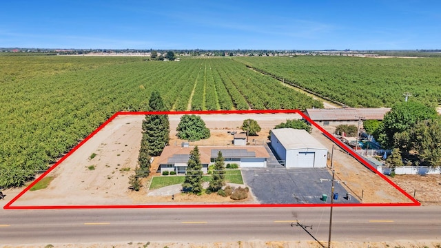 570 S Lassen Ave, Kerman, CA 93630 - aerial view of sparsely populated area with property boundaries highlighted and rows of crops