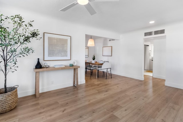 3486 E Lamona Ave, Fresno, CA 93703 - dining room with light wood-type flooring, a ceiling fan, and recessed lighting