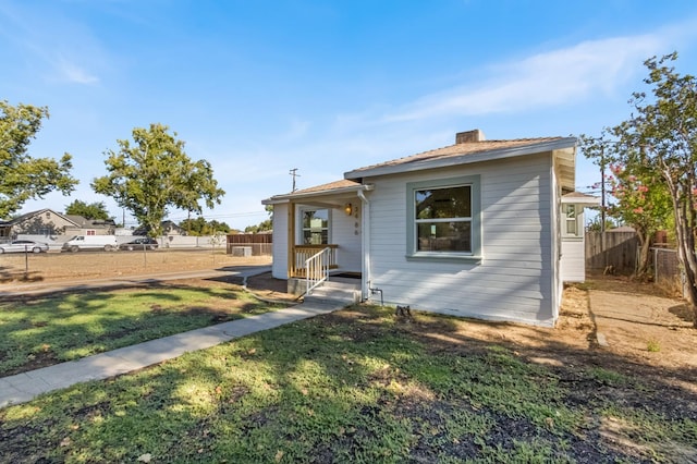 3486 E Lamona Ave, Fresno, CA 93703 - bungalow-style house featuring a chimney