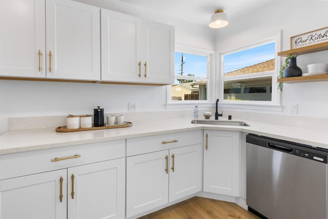 3486 E Lamona Ave, Fresno, CA 93703 - kitchen with dishwasher, white cabinetry, open shelves, and light wood finished floors