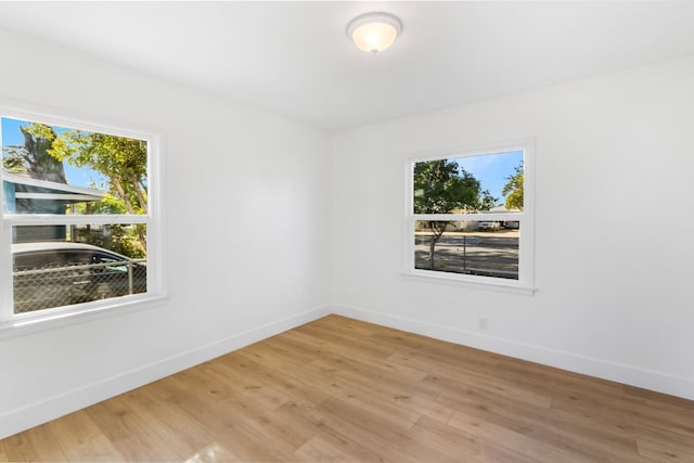 3486 E Lamona Ave, Fresno, CA 93703 - spare room featuring light wood finished floors and baseboards