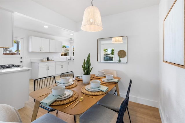 3486 E Lamona Ave, Fresno, CA 93703 - dining space featuring light wood finished floors and recessed lighting