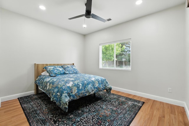 135 N Park Dr, Madera, CA 93637 - bedroom with wood finished floors, recessed lighting, and ceiling fan