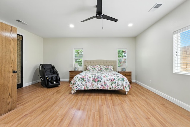 135 N Park Dr, Madera, CA 93637 - bedroom featuring wood finished floors, a ceiling fan, and recessed lighting