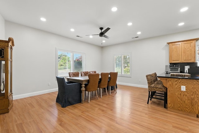 135 N Park Dr, Madera, CA 93637 - dining area featuring plenty of natural light, a ceiling fan, light wood finished floors, and recessed lighting