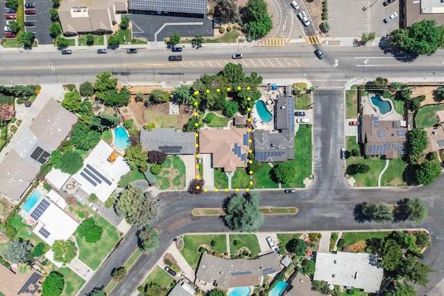 135 N Park Dr, Madera, CA 93637 - aerial view of property's location with nearby suburban area and property boundaries highlighted
