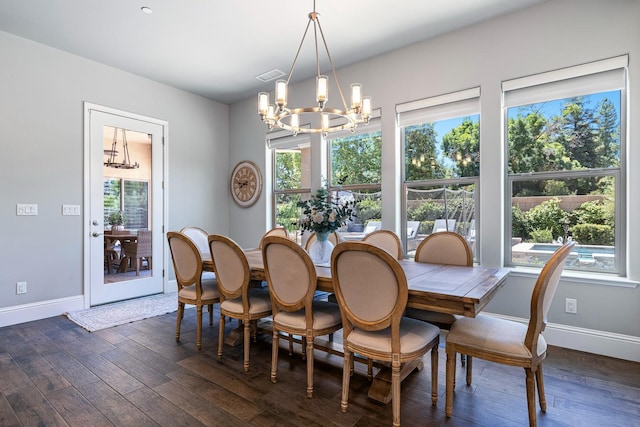 2706 Trenton Ave, Clovis, CA 93619 - dining area with a chandelier, healthy amount of natural light, and dark wood finished floors