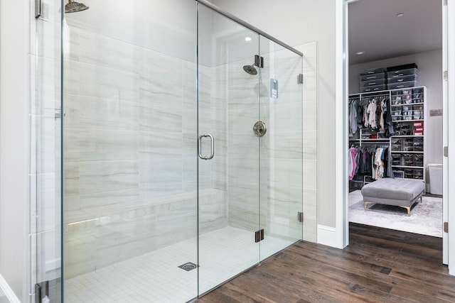 2706 Trenton Ave, Clovis, CA 93619 - full bath with wood finished floors, a stall shower, and a spacious closet
