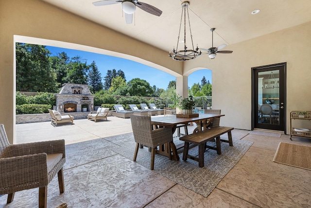 2706 Trenton Ave, Clovis, CA 93619 - view of patio with ceiling fan, an outdoor stone fireplace, and outdoor dining area