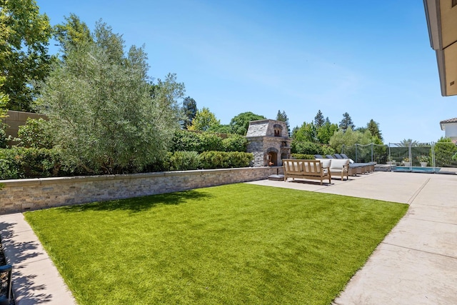 2706 Trenton Ave, Clovis, CA 93619 - view of yard featuring a patio area and an outdoor living space with a fireplace