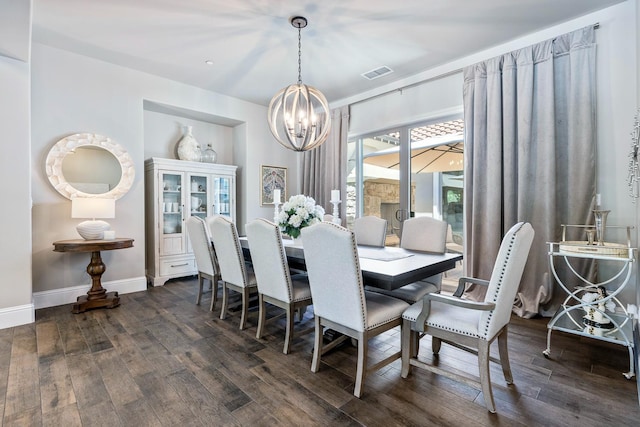 2706 Trenton Ave, Clovis, CA 93619 - dining room featuring a chandelier and dark wood-style floors
