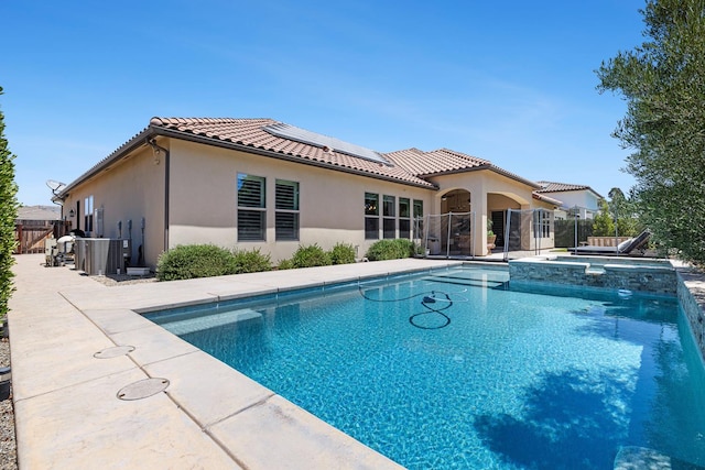 2706 Trenton Ave, Clovis, CA 93619 - view of swimming pool featuring a pool with connected hot tub and a patio