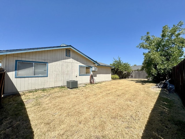 7637 Nixos Way, Sacramento, CA 95823 - fenced backyard with an AC wall unit