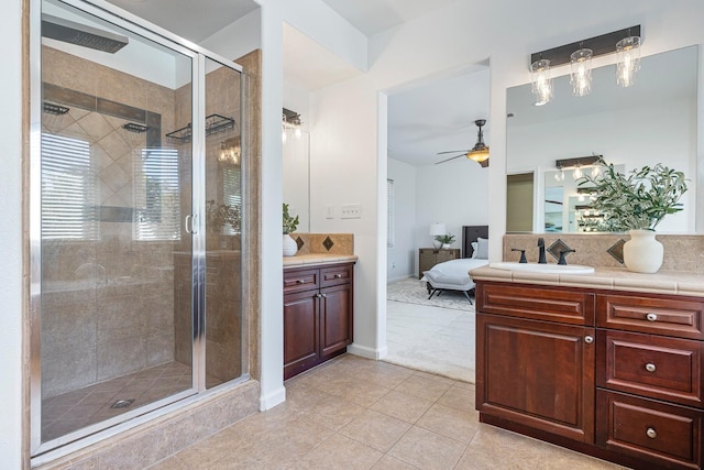 4160 N Creekbend, Clovis, CA 93619 - ensuite bathroom featuring a ceiling fan, vanity, a shower stall, tile patterned flooring, and decorative backsplash