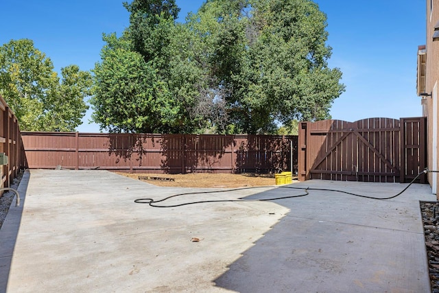 4160 N Creekbend, Clovis, CA 93619 - fenced backyard featuring a gate and a patio