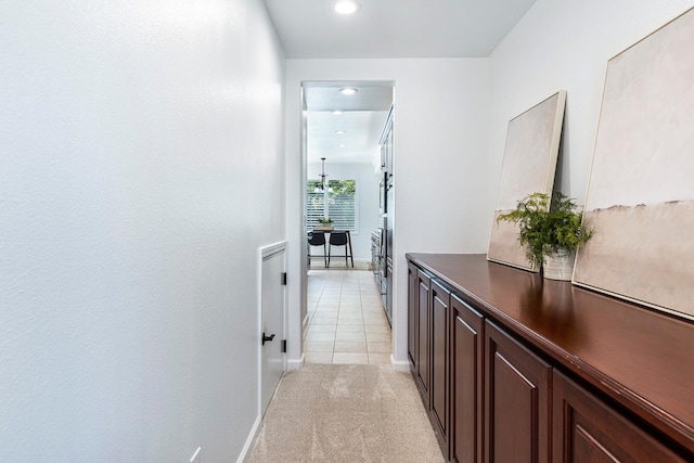 4160 N Creekbend, Clovis, CA 93619 - hallway with recessed lighting, light colored carpet, and light tile patterned floors