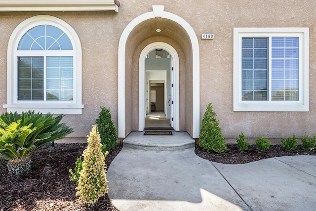 4160 N Creekbend, Clovis, CA 93619 - doorway to property with stucco siding