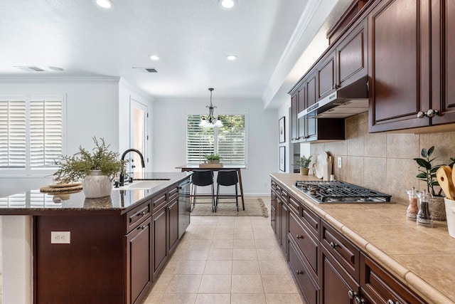 4160 N Creekbend, Clovis, CA 93619 - kitchen with appliances with stainless steel finishes, crown molding, backsplash, a chandelier, and recessed lighting