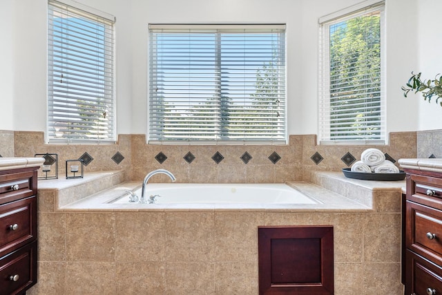4160 N Creekbend, Clovis, CA 93619 - bathroom with vanity, healthy amount of natural light, and a bath