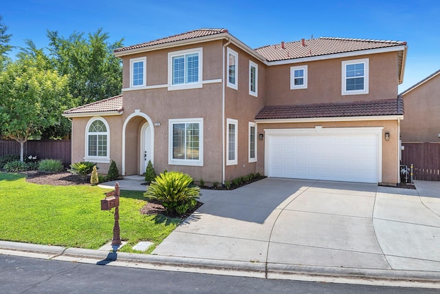 4160 N Creekbend, Clovis, CA 93619 - mediterranean / spanish house with a tile roof, concrete driveway, stucco siding, and a garage