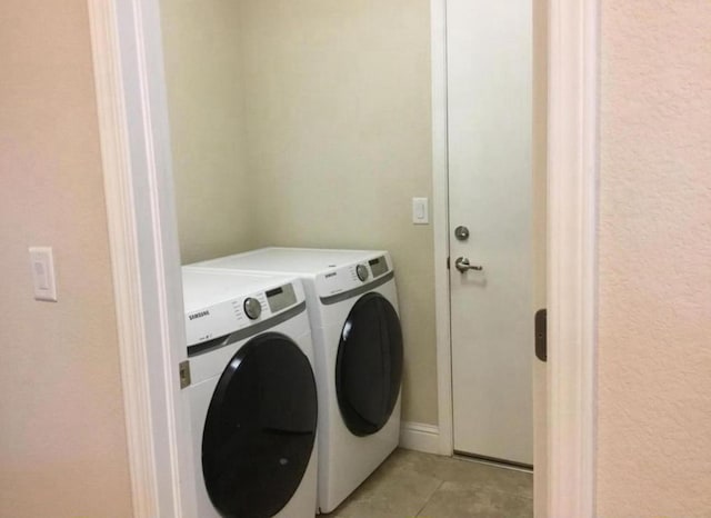 1728 E Green Sage Ave, Fresno, CA 93730 - washroom with independent washer and dryer and light tile patterned floors