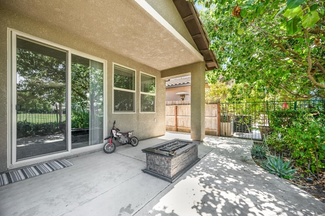 1728 E Green Sage Ave, Fresno, CA 93730 - view of patio / terrace with an outdoor fire pit