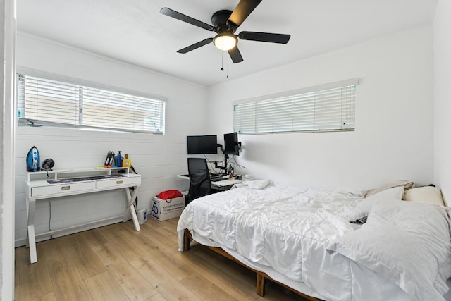 4678 N Thorne Ave, Fresno, CA 93704 - bedroom featuring light wood finished floors and a ceiling fan