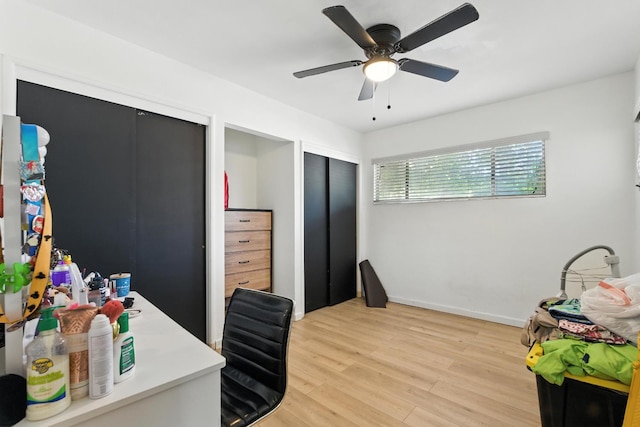4678 N Thorne Ave, Fresno, CA 93704 - office area with light wood-style floors and a ceiling fan
