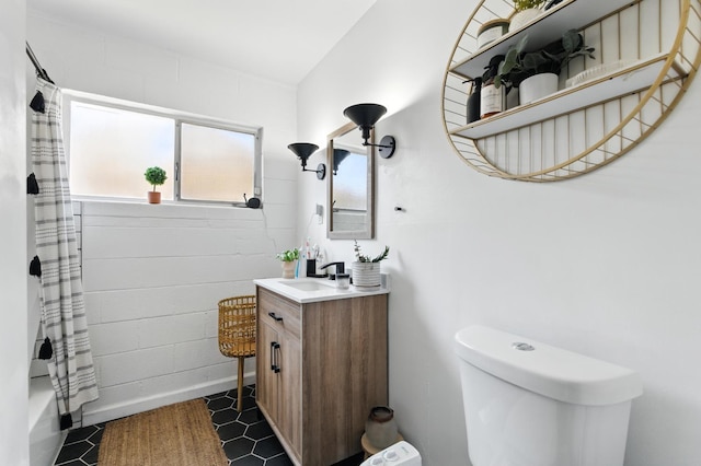 4678 N Thorne Ave, Fresno, CA 93704 - bathroom featuring vanity and shower / bath combination with curtain