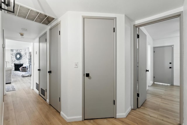 4678 N Thorne Ave, Fresno, CA 93704 - hall featuring light wood finished floors and baseboards