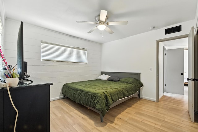 4678 N Thorne Ave, Fresno, CA 93704 - bedroom with light wood-style floors and ceiling fan