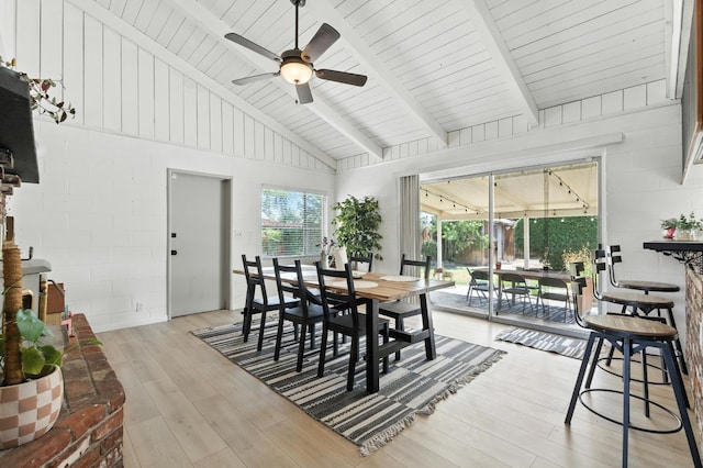 4678 N Thorne Ave, Fresno, CA 93704 - dining space with a ceiling fan, light wood-type flooring, and concrete block wall