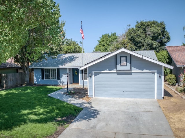 6283 N Gilroy Ave, Fresno, CA 93722 - ranch-style home featuring an attached garage, concrete driveway, and roof with shingles