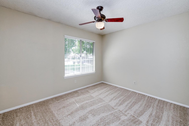 6283 N Gilroy Ave, Fresno, CA 93722 - empty room featuring carpet flooring, ceiling fan, and a textured ceiling