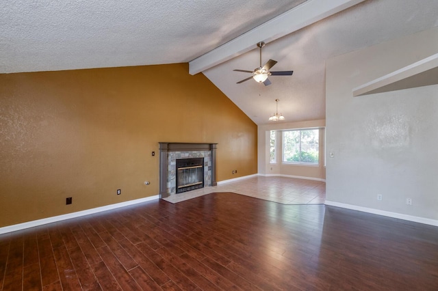 6283 N Gilroy Ave, Fresno, CA 93722 - unfurnished living room featuring beam ceiling, a ceiling fan, a fireplace, wood finished floors, and high vaulted ceiling